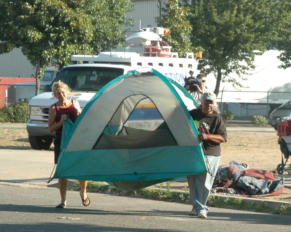 For a while, in early 2006, homeless people would pick up and move their tents and other property from one side of the street to the other to avoid having it destroyed by city sanitation workers and the police.